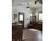 Bright entryway with hardwood floors, wooden staircase, front door and lots of natural light at 2161 N Pennsylvania N St, Indianapolis, IN 46202