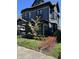 Beautiful Victorian-style home with a welcoming front porch and vibrant landscaping at 2161 N Pennsylvania N St, Indianapolis, IN 46202