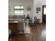 Cozy living room with hardwood floors, large windows, and an inviting layout at 2161 N Pennsylvania N St, Indianapolis, IN 46202