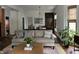 Inviting living room filled with natural light with access to the kitchen and dining room at 2161 N Pennsylvania N St, Indianapolis, IN 46202