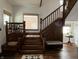Detailed staircase with dark wood, lots of light and charming design at 2161 N Pennsylvania N St, Indianapolis, IN 46202