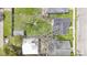 A backyard featuring a fire pit with chairs, shed, and a lush lawn at 223 Grove St, Greenfield, IN 46140