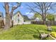 Lush backyard with mature trees, offering a private retreat at 223 Grove St, Greenfield, IN 46140