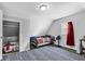 Bedroom featuring a bed, window and laundry basket at 223 Grove St, Greenfield, IN 46140
