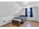Cozy bedroom featuring blue accents, unique flooring, and ample natural light at 223 Grove St, Greenfield, IN 46140