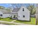 Attractive exterior of a well-maintained home with a cozy front porch and swing at 223 Grove St, Greenfield, IN 46140