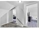 Hallway leading to two bedrooms with unique flooring and lighting at 223 Grove St, Greenfield, IN 46140