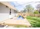 Enjoy the back deck and beautiful backyard with a new wooden privacy fence at 2763 Streamside Dr, Columbus, IN 47203