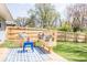 New back deck with backyard seating and a newly constructed fence at 2763 Streamside Dr, Columbus, IN 47203