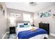 Comfortable bedroom showcasing stylish decor, including a king bed with decorative pillows and artwork at 2763 Streamside Dr, Columbus, IN 47203
