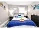 Relaxing bedroom with a plush bed, wine glasses, and charming wall decor at 2763 Streamside Dr, Columbus, IN 47203