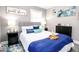 Charming bedroom with a cozy bed, wine glasses, and dark sliding closet doors at 2763 Streamside Dr, Columbus, IN 47203
