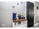 Chic coffee bar with modern amenities and stylish decorative touches by a black door at 2763 Streamside Dr, Columbus, IN 47203