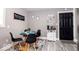 Cozy dining area features a modern table, seating for four, and coffee bar at 2763 Streamside Dr, Columbus, IN 47203