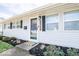 Charming home featuring a welcoming front door and neatly landscaped garden at 2763 Streamside Dr, Columbus, IN 47203