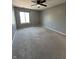 Bedroom features neutral carpet, natural light and a ceiling fan at 2967 Eagles Crest Cir # C, Indianapolis, IN 46214