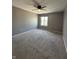 Bedroom with neutral carpet and paint, complete with ceiling fan at 2967 Eagles Crest Cir # C, Indianapolis, IN 46214