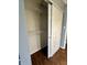 Walk-in closet featuring built-in shelving and vinyl flooring at 2967 Eagles Crest Cir # C, Indianapolis, IN 46214