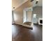 Inviting entryway features hardwood floors, closet, and a bright, open space leading to other rooms at 2967 Eagles Crest Cir # C, Indianapolis, IN 46214
