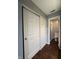 Hallway with closet leading to a bathroom with shower at 2967 Eagles Crest Cir # C, Indianapolis, IN 46214