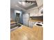 Bright kitchen features white cabinets, laminate countertops, and modern appliances at 2967 Eagles Crest Cir # C, Indianapolis, IN 46214