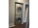 Convenient laundry area features a stacked washer and dryer unit for efficient space-saving at 2967 Eagles Crest Cir # C, Indianapolis, IN 46214