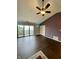 Living room features dark wood floors, ceiling fan and vaulted ceilings at 2967 Eagles Crest Cir # C, Indianapolis, IN 46214