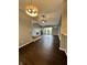 The living room features a fireplace, hardwood floors, and access to dining room and kitchen at 2967 Eagles Crest Cir # C, Indianapolis, IN 46214