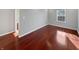 Bright bedroom with hardwood floors and natural light at 3078 Armory Dr, Indianapolis, IN 46208
