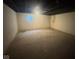 Clean, unfinished basement with small window, providing potential storage or living space at 317 Legacy Blvd, Greenwood, IN 46143