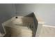 A large bathtub sits against tile and offers a relaxing corner to this main bathroom at 317 Legacy Blvd, Greenwood, IN 46143
