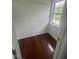 Bright closet space with wood floor, a shelf, and a window for natural light at 317 Legacy Blvd, Greenwood, IN 46143