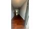 Inviting home entryway with hardwood floors, neutral paint, and access to the living area at 317 Legacy Blvd, Greenwood, IN 46143