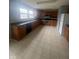 Bright kitchen with oak cabinets and stainless steel appliances at 317 Legacy Blvd, Greenwood, IN 46143