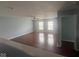 Spacious living room with hardwood flooring and natural lighting at 317 Legacy Blvd, Greenwood, IN 46143