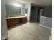 Spacious main bathroom offering double sinks set in a large countertop and a glass enclosed shower at 317 Legacy Blvd, Greenwood, IN 46143