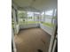 Cozy screened-in porch with view to the backyard at 317 Legacy Blvd, Greenwood, IN 46143