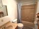 Functional bathroom with vanity, toilet, and a shower-tub combination at 3282 S Conservation Club Rd, Morgantown, IN 46160