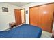 Bedroom featuring a comfortable bed, closet, and plenty of natural light at 3282 S Conservation Club Rd, Morgantown, IN 46160