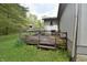 Backyard view of the weathered wooden deck attached to the home at 3282 S Conservation Club Rd, Morgantown, IN 46160