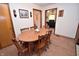 Cozy dining area features a wood table with seating for six at 3282 S Conservation Club Rd, Morgantown, IN 46160