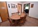 Eat-in kitchen featuring a table and chairs, and access to the living room at 3282 S Conservation Club Rd, Morgantown, IN 46160