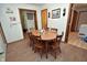 Cozy dining area features a wood table with seating for six at 3282 S Conservation Club Rd, Morgantown, IN 46160
