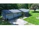 Overhead view of a home with an attached garage, concrete driveway and covered front porch with seating at 3282 S Conservation Club Rd, Morgantown, IN 46160