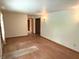 Spacious living room featuring hardwood flooring, and neutral wall color perfect for your personal design touches at 3282 S Conservation Club Rd, Morgantown, IN 46160