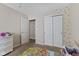 Bedroom with carpet, closet, and interior door at 3311 Stoddard Pl, Indianapolis, IN 46217