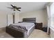 Relaxing bedroom with neutral walls, carpet, a ceiling fan, and comfortable bed at 3311 Stoddard Pl, Indianapolis, IN 46217