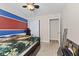 Bedroom featuring a statement wall and closet at 3311 Stoddard Pl, Indianapolis, IN 46217