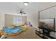 Bonus room with carpet and tv at 3311 Stoddard Pl, Indianapolis, IN 46217