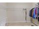 Walk-in closet featuring wire shelving, carpet, and hanging clothes at 3311 Stoddard Pl, Indianapolis, IN 46217